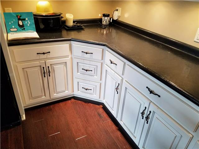 Painted and glazed cabinets -laminate countertops